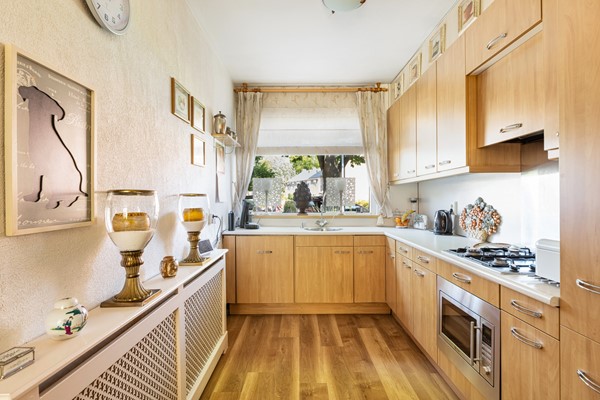 Foto - Te koop: Goed onderhouden tussenwoning in rustige woonwijk!